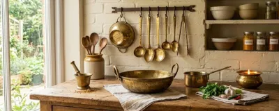 Handcrafted brass kitchenware and spice jars displayed in a modern aesthetic kitchen