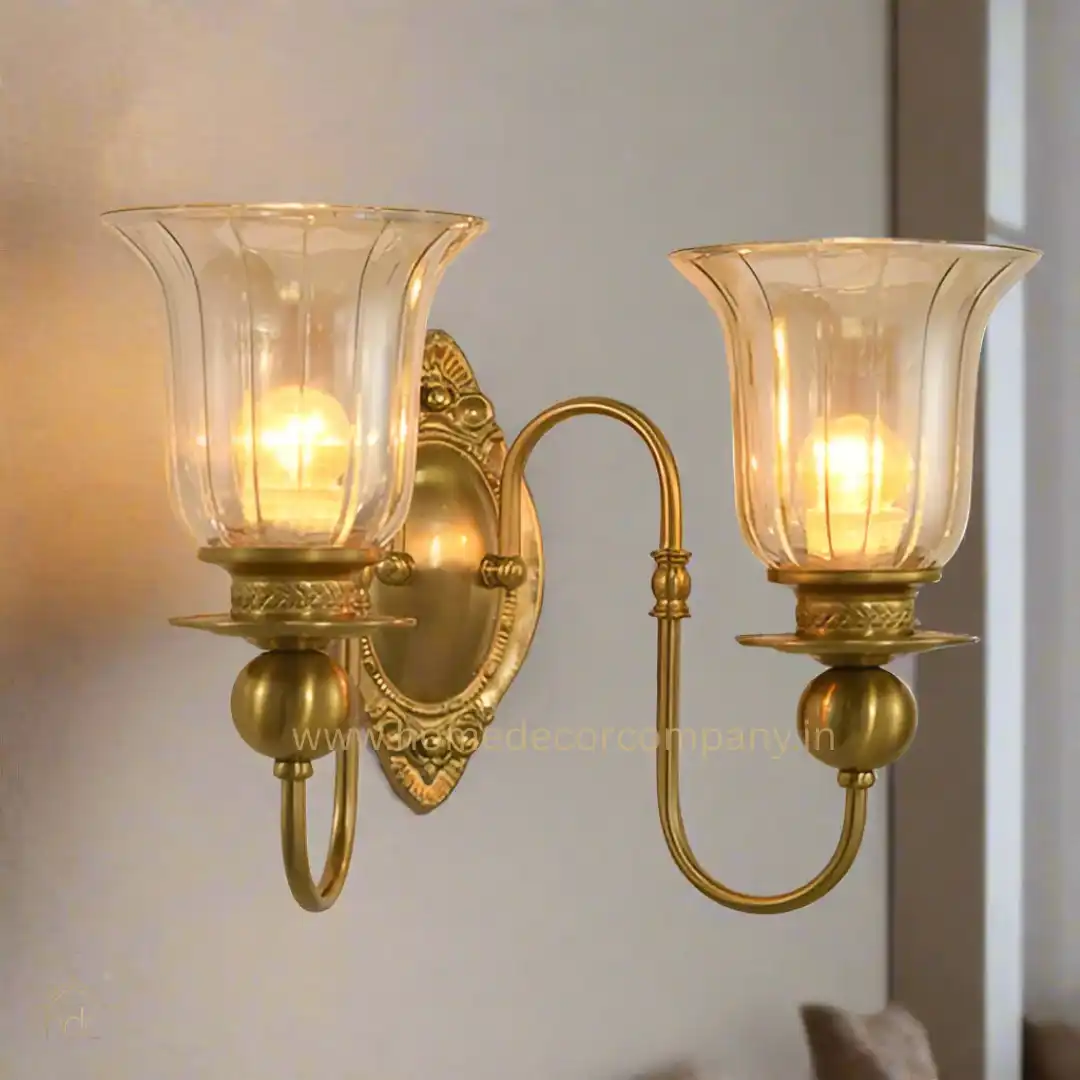 Handmade brass lighting decor manufactured in India featuring brass lanterns, pendant lights, hanging lights, candle holders, wall lighting, and custom brass lighting products for wholesale buyers and global importers