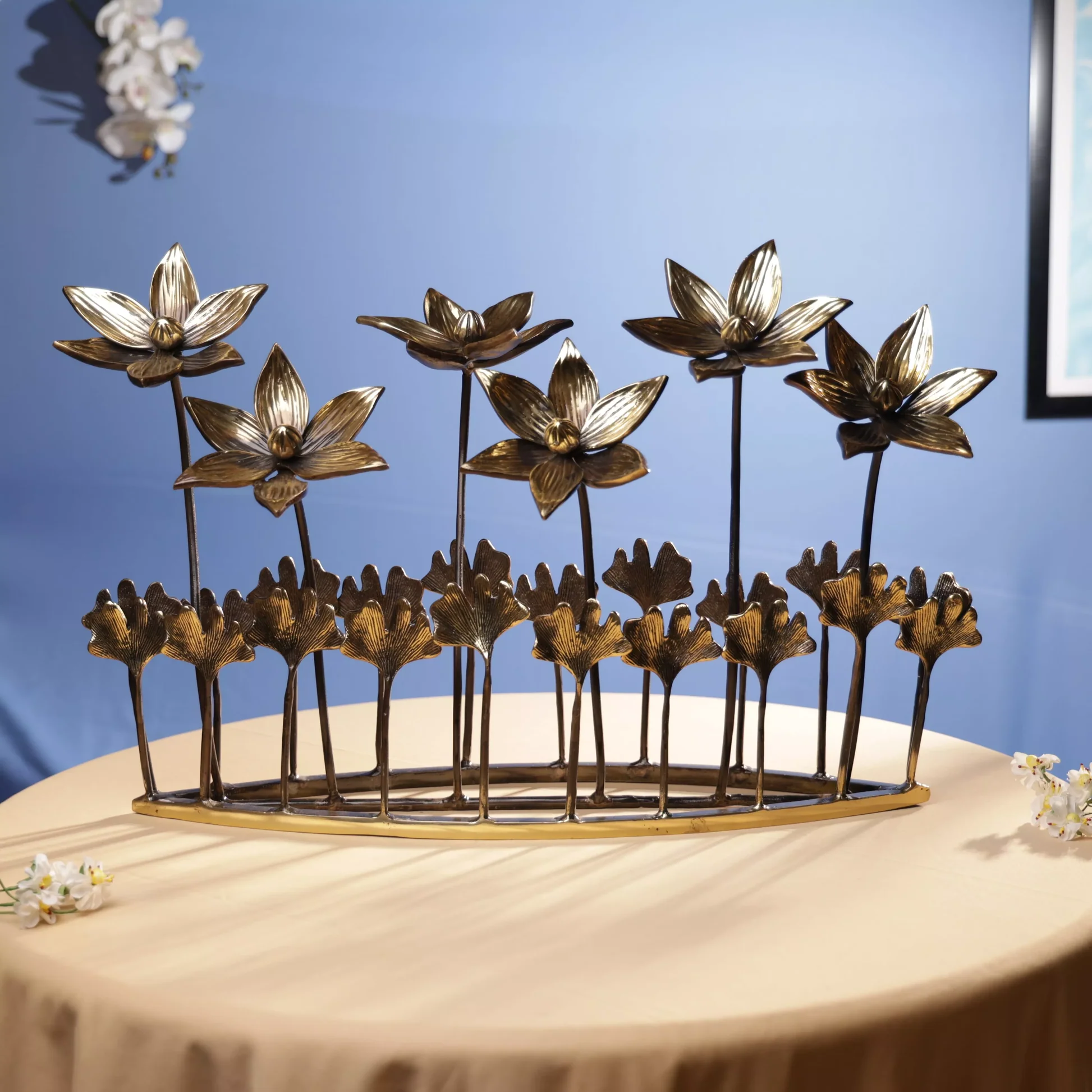 Handmade brass table decor manufactured in India featuring brass centerpieces, decorative bowls, candle holders, trays, figurines, and custom tabletop decor products for wholesale buyers and global importers.