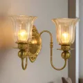 Handmade brass lighting decor manufactured in India featuring brass lanterns, pendant lights, hanging lights, candle holders, wall lighting, and custom brass lighting products for wholesale buyers and global importers