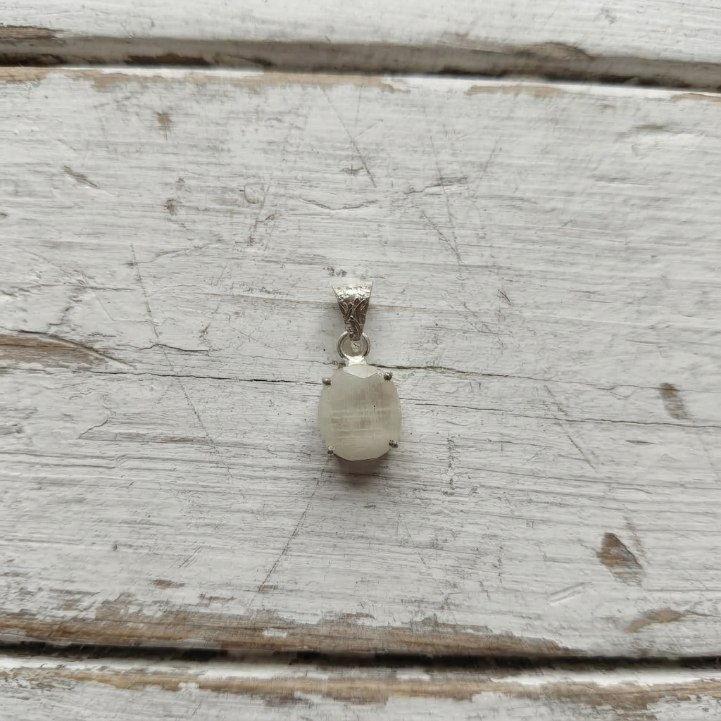 Oval Rainbow Moonstone Pendant With Silver Tone Bail And Prongs