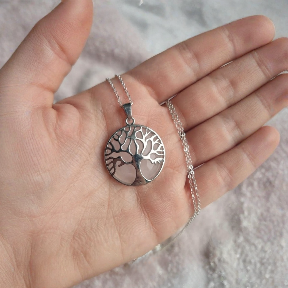 Pink Rose Quartz Tree Of Life jewelry shown on a silver-tone chain