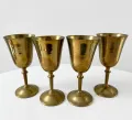 Handcrafted solid brass goblets with polished finish displayed as premium wholesale brass drinkware for hospitality, gifting, and international export markets.