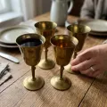 Set of handcrafted solid brass goblets with polished finish for wholesale hospitality and tableware buyers