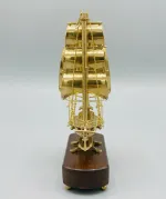 Handmade vintage brass sailing ship model with wooden base for luxury home and office decor