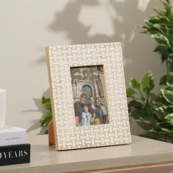 Handcrafted mother of pearl photo frame with geometric shell inlay pattern for luxury home décor