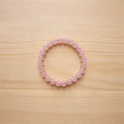 Rose Quartz Bracelet With Light Pink Round Beads Worn On Wrist - 2nd View